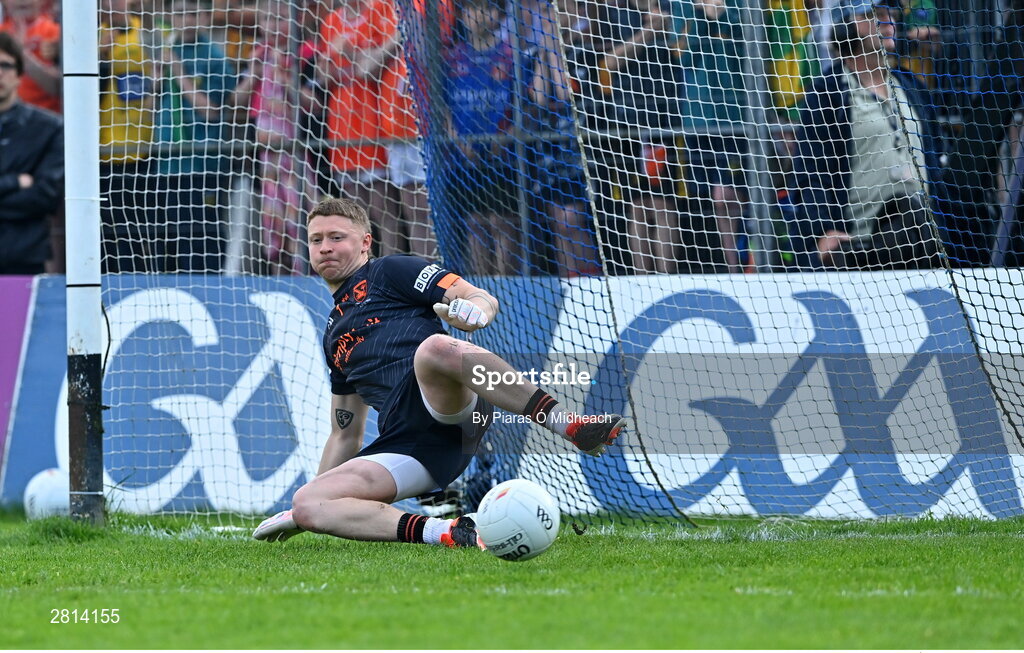 12 May 2024; Armagh goalkeeper Blaine Hughes is beaten for a goal from a penalty from Jason McGee of Donegal in the penalty shoot-out of the Ulster GAA Football Senior Championship final match between Armagh and Donegal at St Tiernach's Park in Clones, Monaghan. Photo by Piaras Ó Mídheach/Sportsfile