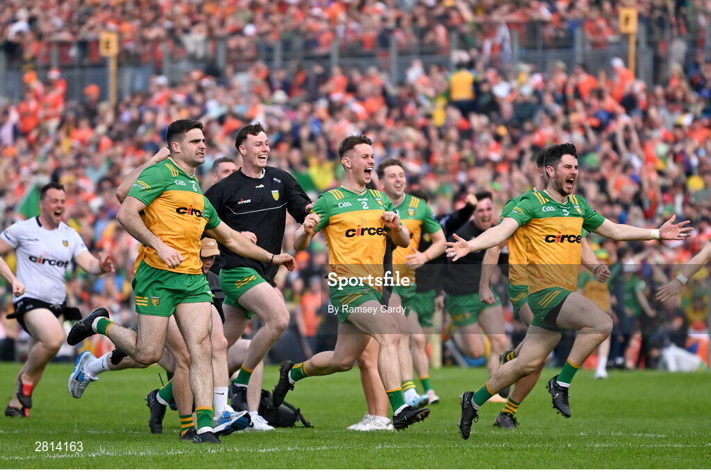 12 May 2024; Donegal players Caolan McGonagle, Mark Curran and Ryan McHugh celebrate winning the penalty shoot-out after the Ulster GAA Football Senior Championship final match between Armagh and Donegal at St Tiernach's Park in Clones, Monaghan. Photo by Ramsey Cardy/Sportsfile
