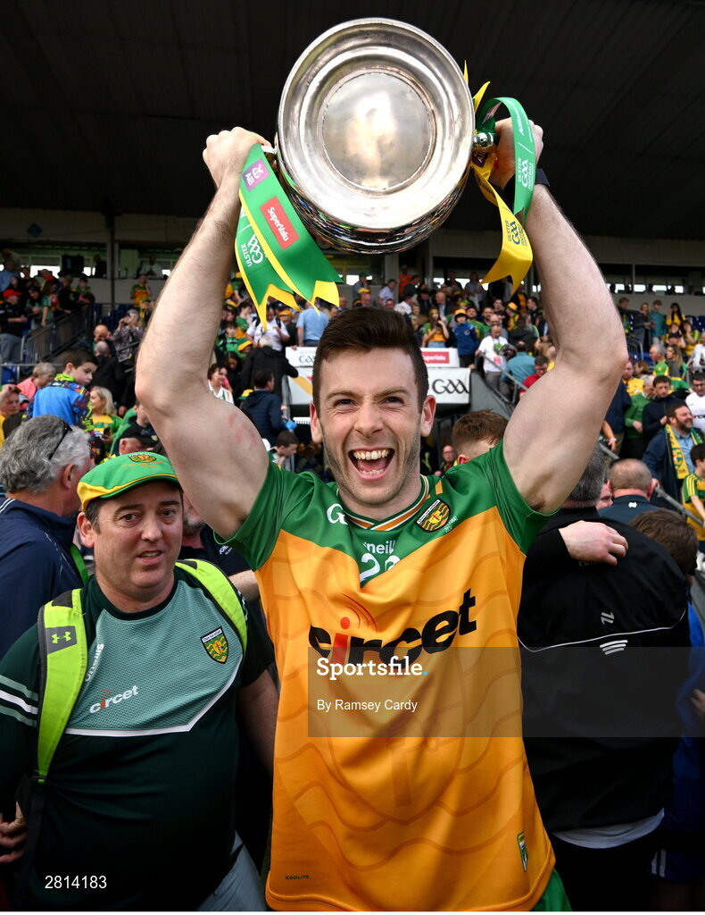 12 May 2024; Eoghán Bán Gallagher of Donegal lifts the Anglo Celt Cup the Ulster GAA Football Senior Championship final match between Armagh and Donegal at St Tiernach's Park in Clones, Monaghan. Photo by Ramsey Cardy/Sportsfile