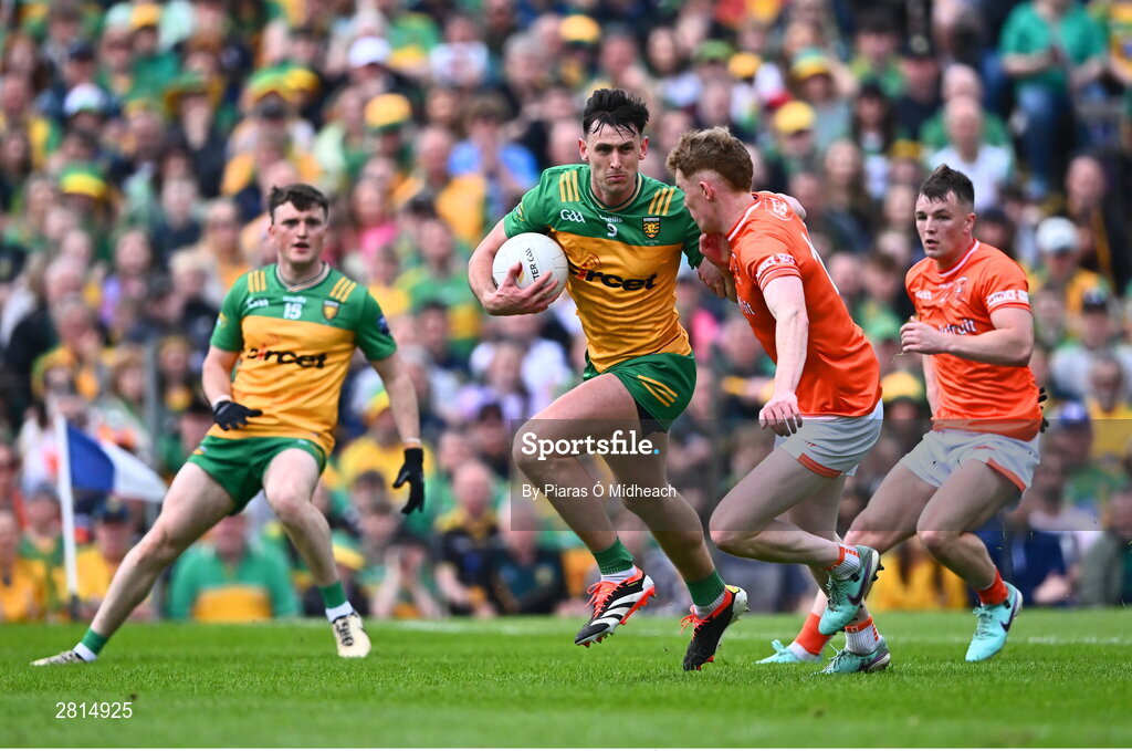 12 May 2024; Michael Langan of Donegal in action against Conor Turbitt of Armagh  during the Ulster GAA Football Senior Championship final match between Armagh and Donegal at St Tiernach's Park in Clones, Monaghan. Photo by Piaras Ó Mídheach/Sportsfile