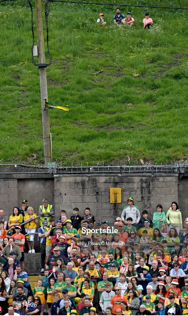 12 May 2024; Spectators look on from a nearby field during the Ulster GAA Football Senior Championship final match between Armagh and Donegal at St Tiernach's Park in Clones, Monaghan. Photo by Piaras Ó Mídheach/Sportsfile