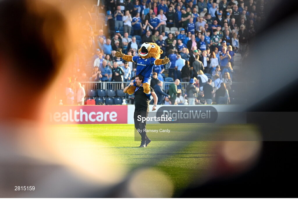 11 May 2024; Leinster mascot Leo the Lion with Mike McCarthy before the United Rugby Championship match between Leinster and Ospreys at the RDS Arena in Dublin. Photo by Ramsey Cardy/Sportsfile