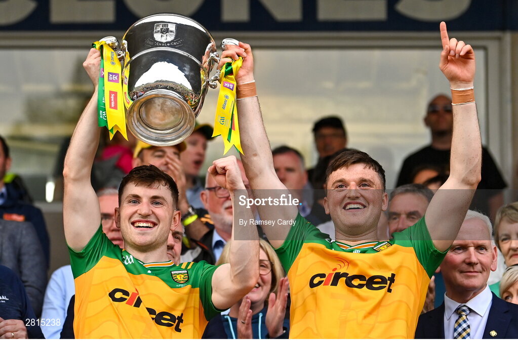 12 May 2024; Shane O'Donnell, left, and Niall O'Donnell of Donegal lifts the Anglo Celt Cup after the Ulster GAA Football Senior Championship final match between Armagh and Donegal at St Tiernach's Park in Clones, Monaghan. Photo by Ramsey Cardy/Sportsfile