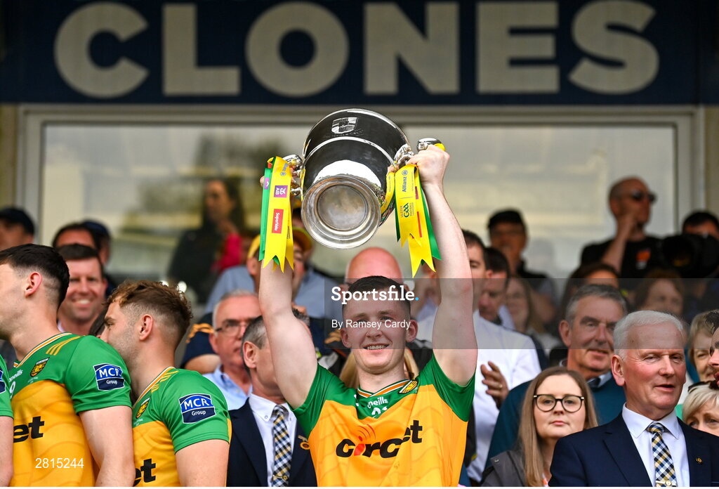 12 May 2024; Jeaic MacCeallbhuí of Donegal lifts the Anglo Celt Cup after the Ulster GAA Football Senior Championship final match between Armagh and Donegal at St Tiernach's Park in Clones, Monaghan. Photo by Ramsey Cardy/Sportsfile