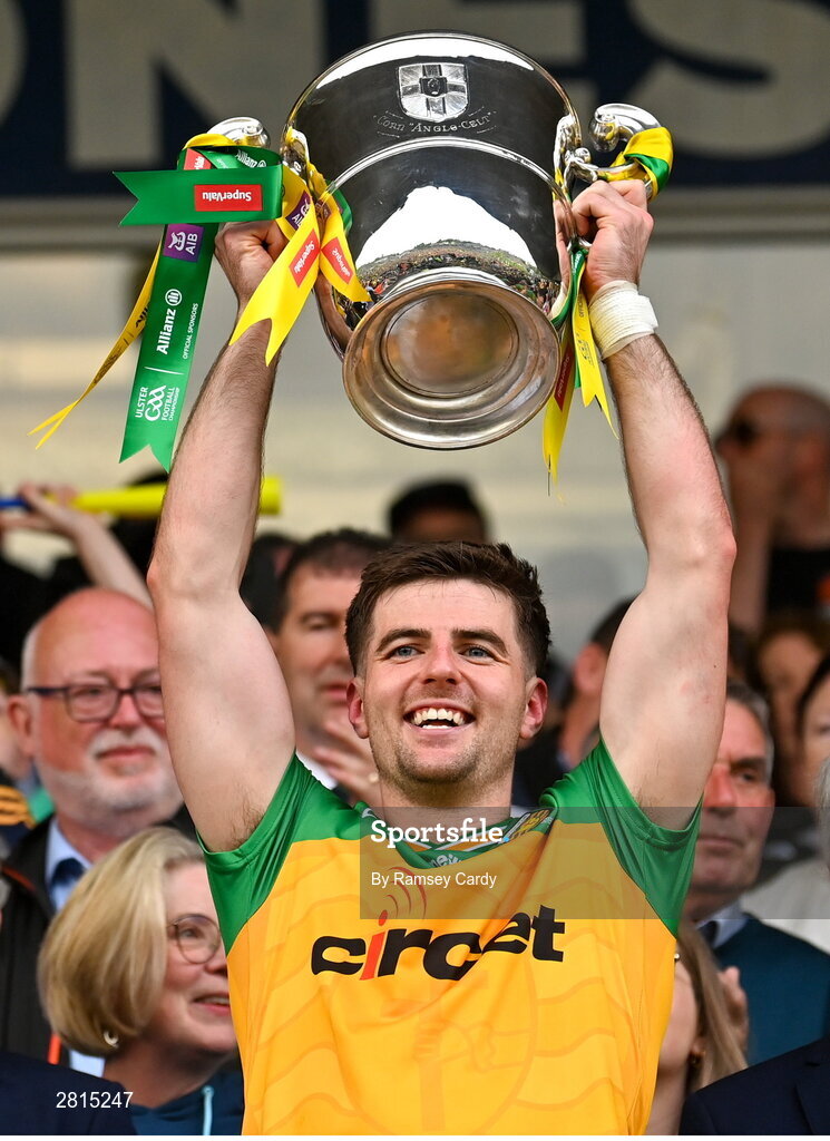 12 May 2024; Daire O Baoill of Donegal lifts the Anglo Celt Cup after the Ulster GAA Football Senior Championship final match between Armagh and Donegal at St Tiernach's Park in Clones, Monaghan. Photo by Ramsey Cardy/Sportsfile