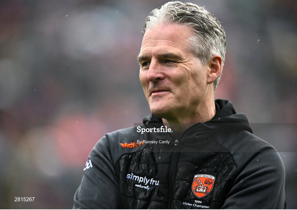 12 May 2024; Jarlath Burns, captain of the 1999 winning Armagh Ulster Football Senior Championship team, and Uachtarán Chumann Lúthchleas Gael, during the Ulster GAA Football Senior Championship final match between Armagh and Donegal at St Tiernach's Park in Clones, Monaghan. Photo by Ramsey Cardy/Sportsfile