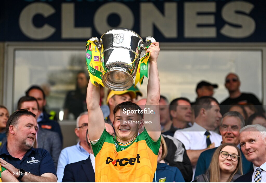 12 May 2024; Odhran Doherty of Donegal lifts the Anglo Celt Cup after the Ulster GAA Football Senior Championship final match between Armagh and Donegal at St Tiernach's Park in Clones, Monaghan. Photo by Ramsey Cardy/Sportsfile