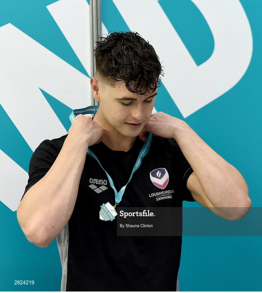 23 May 2024; Conor Ferguson of Larne Swimming Club with his medal after winning the Men's 100m Backstroke Super Final during day two of the Ireland Olympic Swimming Trials at the National Aquatic Centre on the Sport Ireland Campus in Dublin. Photo by Shauna Clinton/Sportsfile