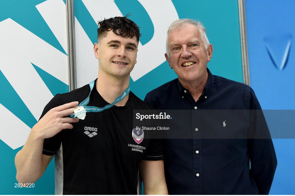 23 May 2024; Conor Ferguson of Larne Swimming Club is presented with his medal after winning the Men's 100m Backstroke Super Final during day two of the Ireland Olympic Swimming Trials at the National Aquatic Centre on the Sport Ireland Campus in Dublin. Photo by Shauna Clinton/Sportsfile