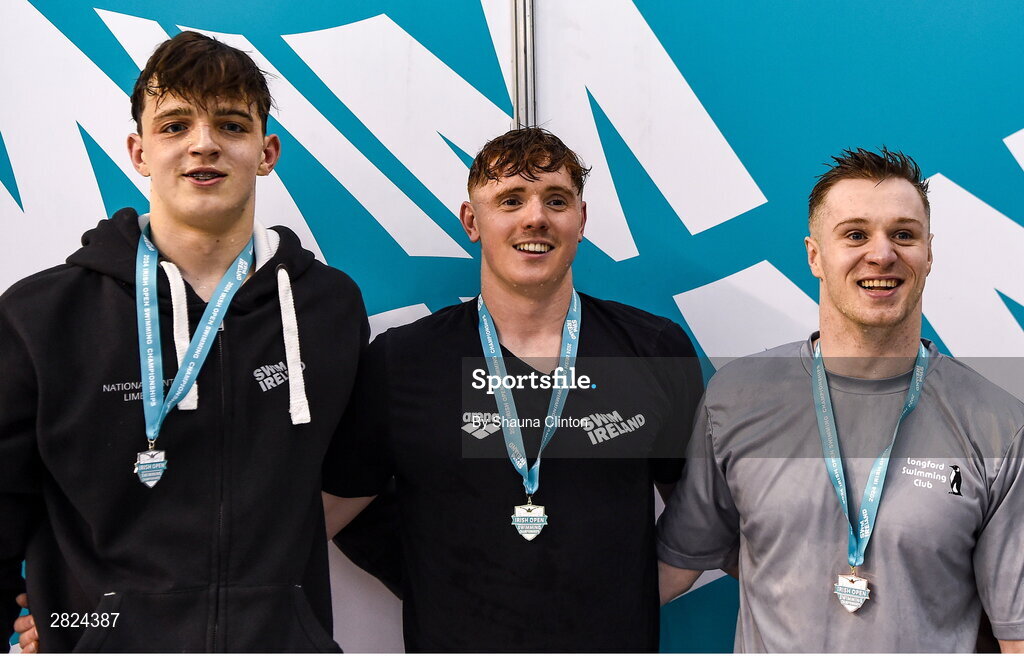 23 May 2024; Finn McGeever of National Centre Limerick, centre, who won gold, with Cornac Rynn of Trident Swimming Club, left, who won silver, and Gerry Quinn of Longford Swimming Club, who won bronze, right, after competing in the Men's 200m Freestyle Super Final during day two of the Ireland Olympic Swimming Trials at the National Aquatic Centre on the Sport Ireland Campus in Dublin. Photo by Shauna Clinton/Sportsfile