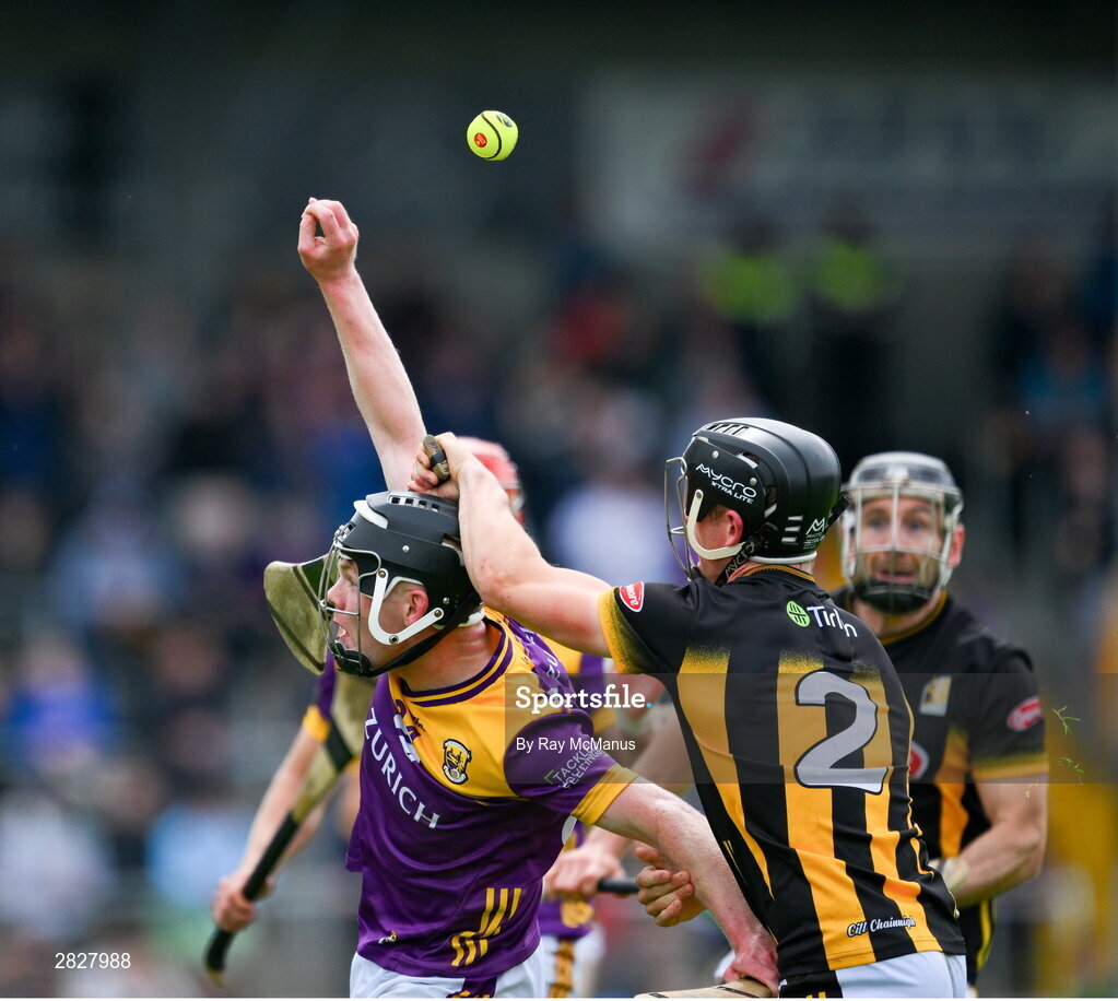 26 May 2024; Cian Byrne of Wexford and Mikey Butler of Kilkenny both miss the sliotar during the Leinster GAA Hurling Senior Championship Round 5 match between Kilkenny and Wexford at UPMC Nowlan Park in Kilkenny. Photo by Ray McManus/Sportsfile