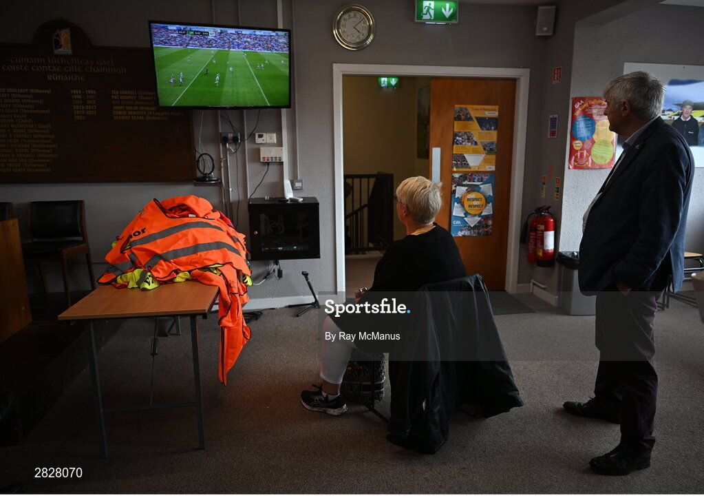 26 May 2024; Carmel Kenny, wife of KIlkenny GAA County Board Chairman PJ Kenny, from Clara GAA Club, in Kilkenny, and former TD Tony Dempsey of Wexford watch the Limerick v Waterford on tv after the Leinster GAA Hurling Senior Championship Round 5 match between Kilkenny and Wexford at UPMC Nowlan Park in Kilkenny. Photo by Ray McManus/Sportsfile