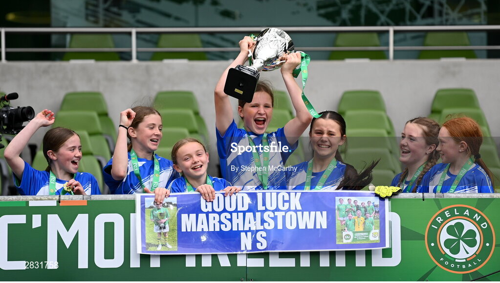 29 May 2024; Marshalstown NS, Wexford, players celebrate after winning the girls B cup, for medium schools, during the FAI Primary 5s Finals day at Aviva Stadium in Dublin. Photo by Stephen McCarthy/Sportsfile