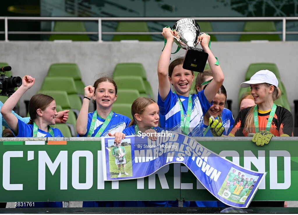 29 May 2024; Marshalstown NS, Wexford, players celebrate after winning the girls B cup, for medium schools, during the FAI Primary 5s Finals day at Aviva Stadium in Dublin. Photo by Stephen McCarthy/Sportsfile