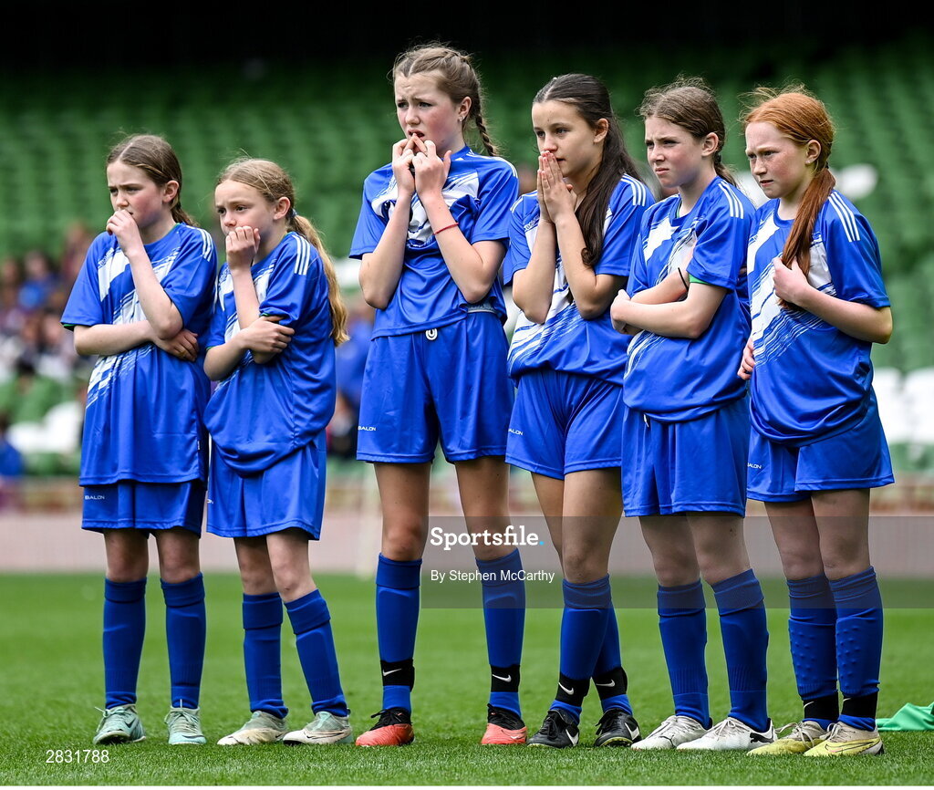29 May 2024; Marshalstown NS, Wexford, players during a penalty shoot-out of a play-off match in the finals of the girls B cup, for medium schools, during the FAI Primary 5s Finals day at Aviva Stadium in Dublin. Photo by Stephen McCarthy/Sportsfile