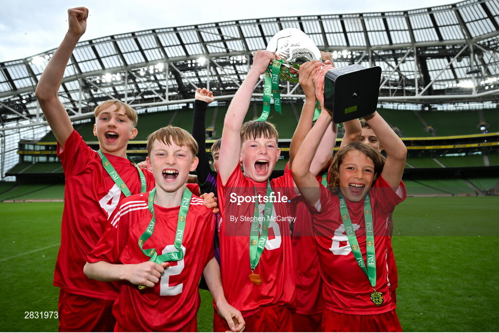 29 May 2024; Beaumont BNS, Blackrock, Cork, players celebrate winning the section C cup, for mixed large sized schools, during the FAI Primary 5s Finals day at Aviva Stadium in Dublin. Photo by Stephen McCarthy/Sportsfile