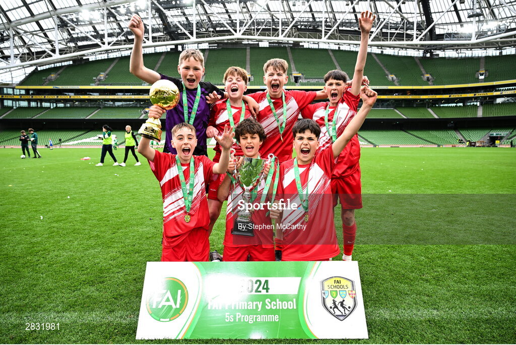 29 May 2024; Gaelscoil Choinn tSáile, Cork, celebrate after winning the B Cup, for mixed medium sized schools, during the FAI Primary 5s Finals day at Aviva Stadium in Dublin. Photo by Stephen McCarthy/Sportsfile