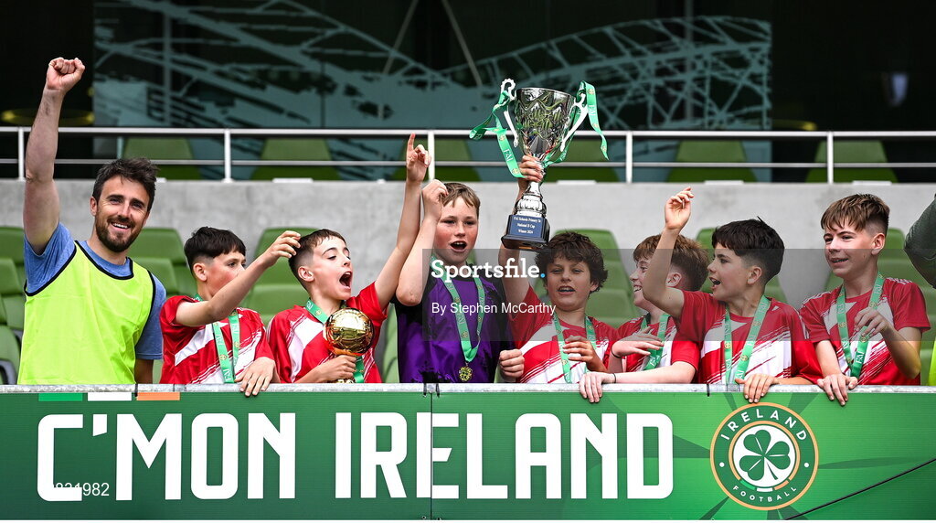 29 May 2024; Gaelscoil Choinn tSáile, Cork, celebrate after winning the B Cup, for mixed medium sized schools, during the FAI Primary 5s Finals day at Aviva Stadium in Dublin. Photo by Stephen McCarthy/Sportsfile