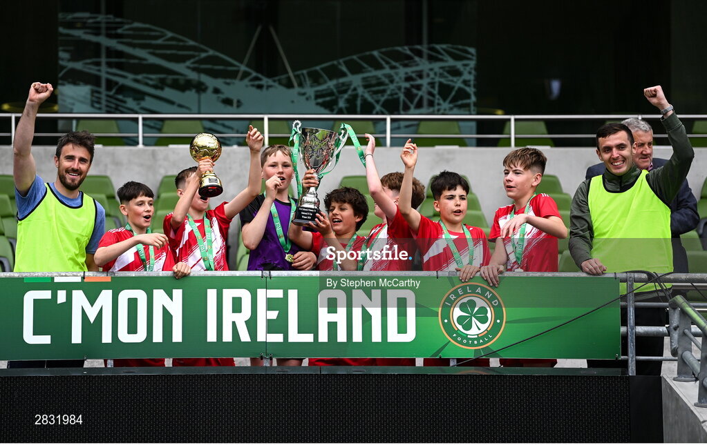 29 May 2024; Gaelscoil Choinn tSáile, Cork, celebrate after winning the B Cup, for mixed medium sized schools, during the FAI Primary 5s Finals day at Aviva Stadium in Dublin. Photo by Stephen McCarthy/Sportsfile