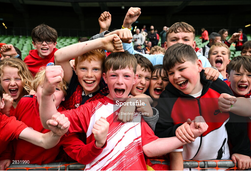 29 May 2024; Seán Connolly of Beaumont BNS, Blackrock, Cork, celebrates with supporters after his side won the A cup, for mixed small sized schools, during the FAI Primary 5s Finals day at Aviva Stadium in Dublin. Photo by Stephen McCarthy/Sportsfile