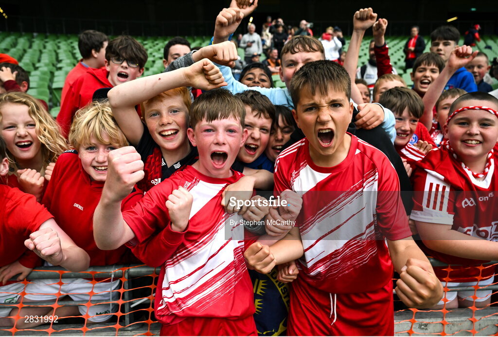 29 May 2024; Beaumont BNS, Blackrock, Cork, players Seán Connolly, left, and Tadhg Quirke celebrate after they won the A cup, for mixed small sized schools, during the FAI Primary 5s Finals day at Aviva Stadium in Dublin. Photo by Stephen McCarthy/Sportsfile