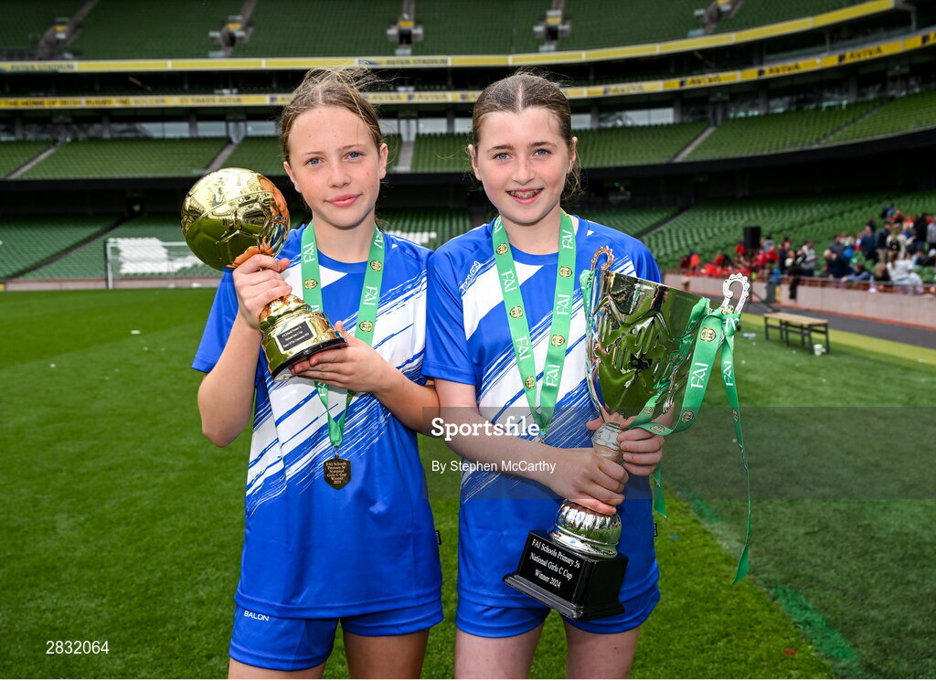29 May 2024; Hattie Farrell, left, and Freya Field of Our Lady’s Grove PS, Dublin, celebrates after winning the girls C cup, for large sized schools, during the FAI Primary 5s Finals day at Aviva Stadium in Dublin. Photo by Stephen McCarthy/Sportsfile