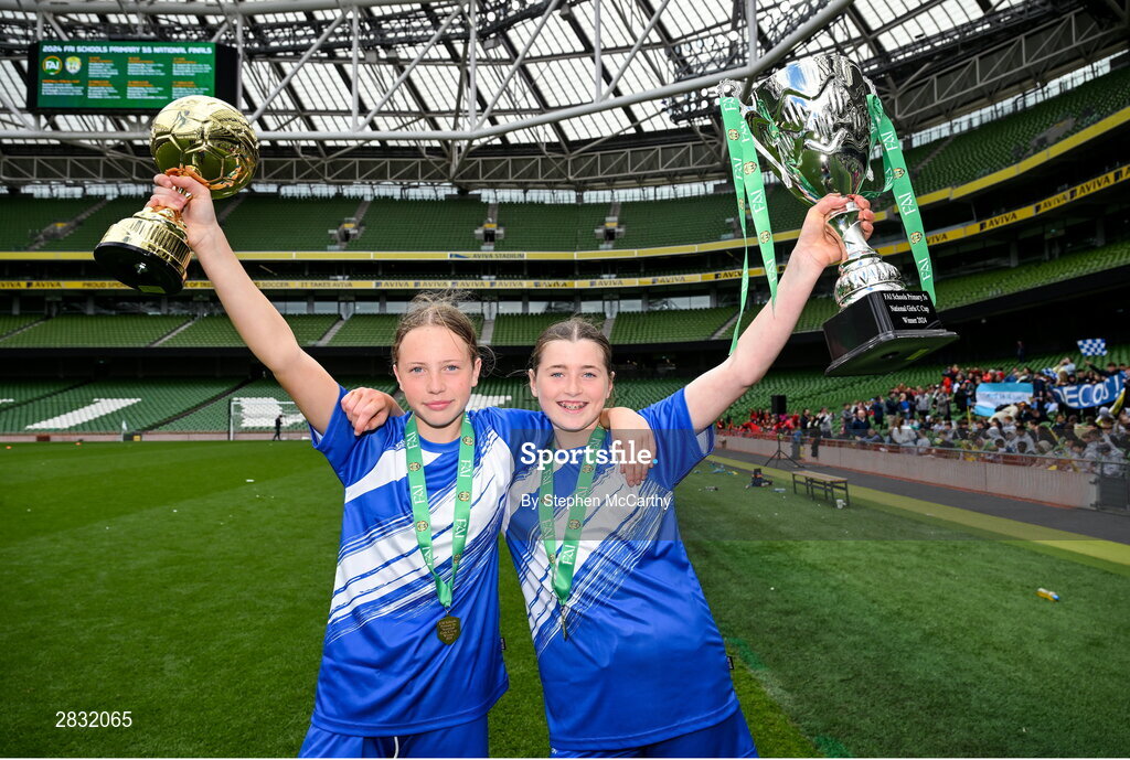 29 May 2024; Hattie Farrell, left, and Freya Field of Our Lady’s Grove PS, Dublin, celebrates after winning the girls C cup, for large sized schools, during the FAI Primary 5s Finals day at Aviva Stadium in Dublin. Photo by Stephen McCarthy/Sportsfile