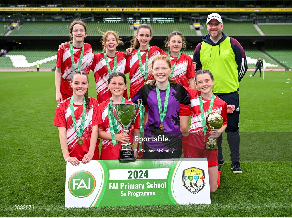 29 May 2024; Gurrane NS, Cork, celebrate after winning the girls section A cup, for small sized schools, during the FAI Primary 5s Finals day at Aviva Stadium in Dublin. Photo by Stephen McCarthy/Sportsfile