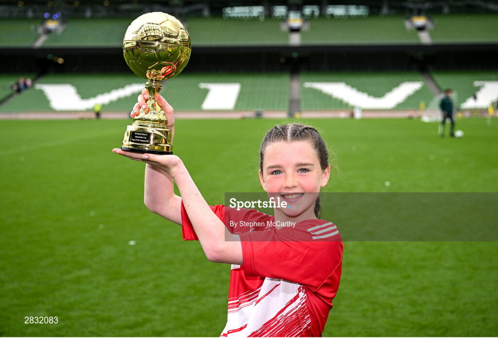 29 May 2024; Roise Walsh of Gurrane NS, Cork, with the Player of the Tournament award for girls section A cup, for small sized schools, during the FAI Primary 5s Finals day at Aviva Stadium in Dublin. Photo by Stephen McCarthy/Sportsfile