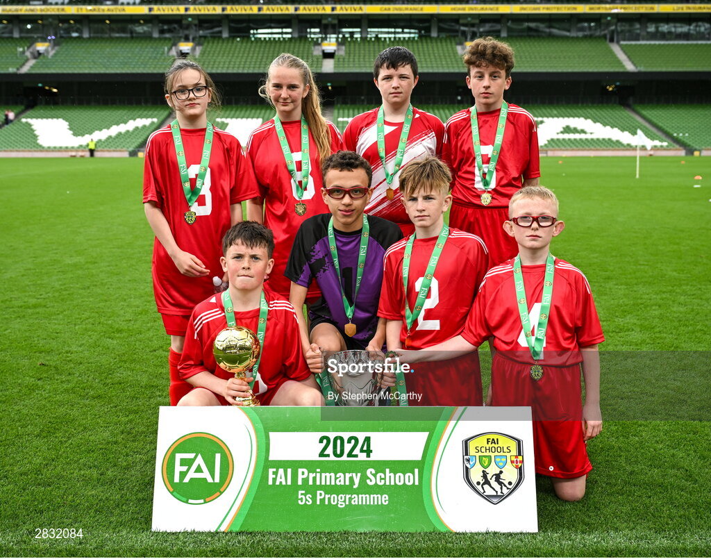 29 May 2024; Catherine McAuley School, Limerick, celebrate after winning the Football For All cup during the FAI Primary 5s Finals day at Aviva Stadium in Dublin. Photo by Stephen McCarthy/Sportsfile