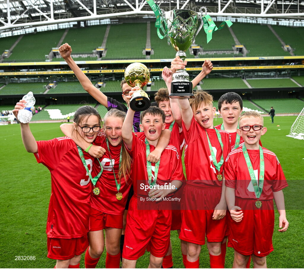 29 May 2024; Catherine McAuley School, Limerick, celebrate after winning the Football For All cup during the FAI Primary 5s Finals day at Aviva Stadium in Dublin. Photo by Stephen McCarthy/Sportsfile
