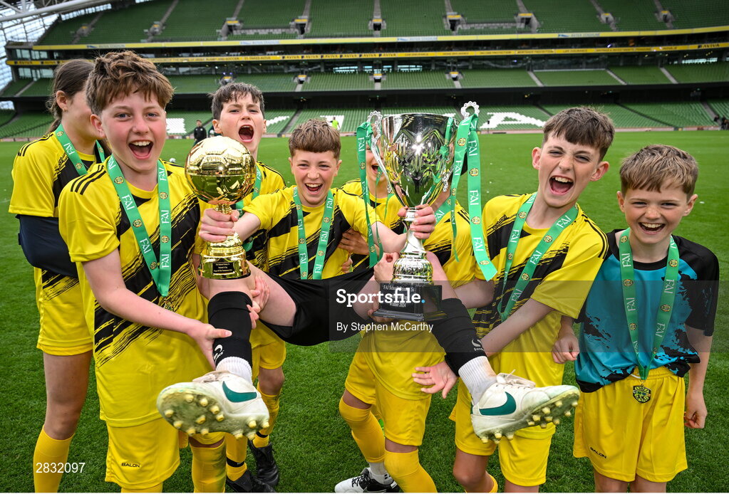 29 May 2024; Gaelscoil Cois Feabhail, Craigtown, Donegal, players celebrates after winning the section A cup, for mixed small sized schools, during the FAI Primary 5s Finals day at Aviva Stadium in Dublin. Photo by Stephen McCarthy/Sportsfile