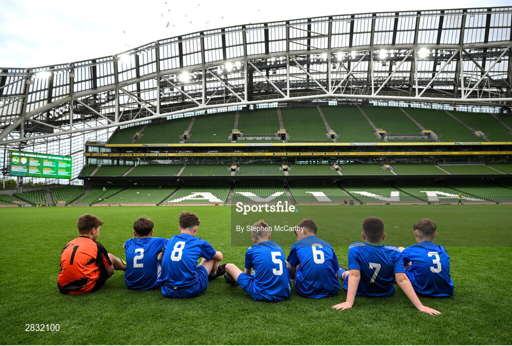 29 May 2024; Kentstown NS, Meath, players take a moment after the FAI Primary 5s Finals day at Aviva Stadium in Dublin. Photo by Stephen McCarthy/Sportsfile