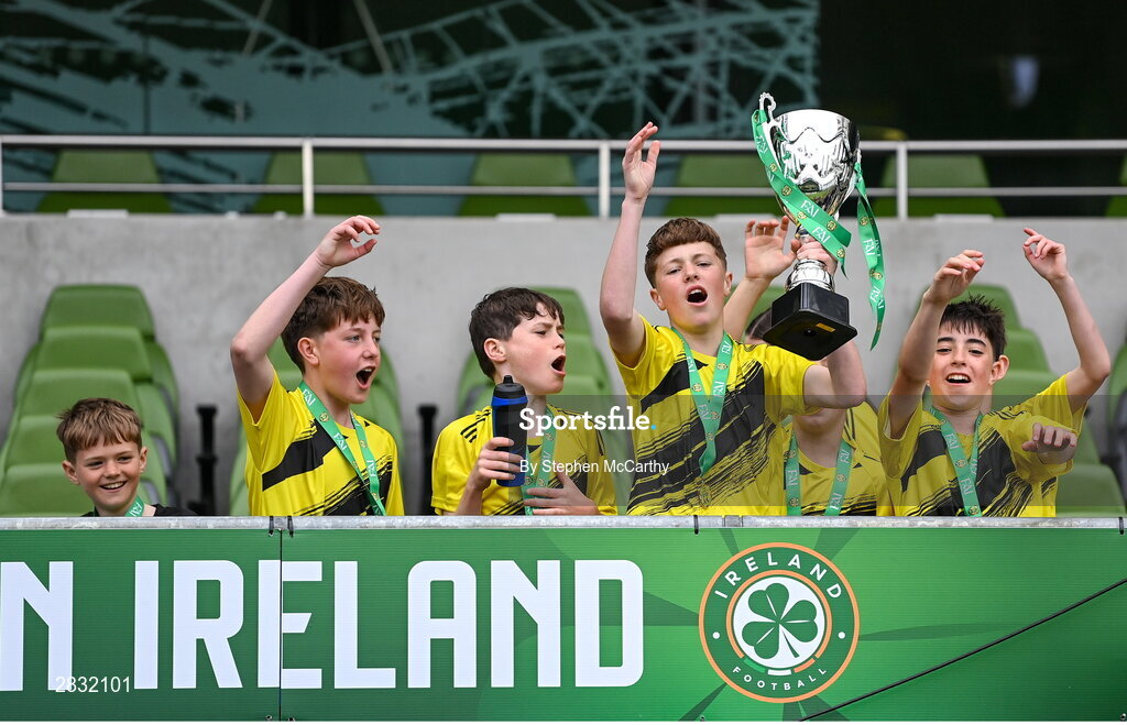 29 May 2024; Gaelscoil Cois Feabhail, Craigtown, Donegal, players celebrates after winning the section A cup, for mixed small sized schools, during the FAI Primary 5s Finals day at Aviva Stadium in Dublin. Photo by Stephen McCarthy/Sportsfile