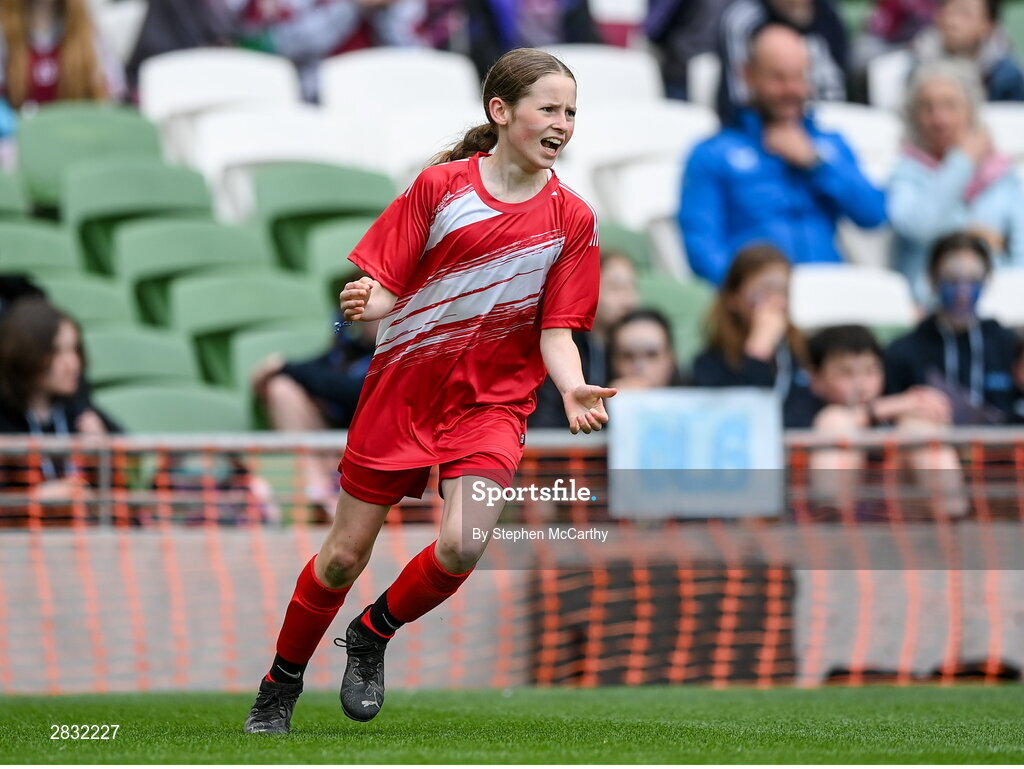 29 May 2024; Emily Ní Dhonnabháin of Gaelscoil Uí Ríordáin, Baile an Chollaigh, Co Chorcaí, celebrates a goal during the FAI Primary 5s Finals day at Aviva Stadium in Dublin. Photo by Stephen McCarthy/Sportsfile