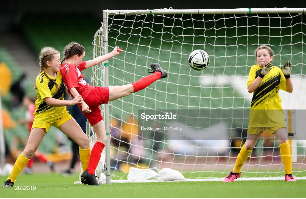 29 May 2024; Roise Walsh of Gurrane NS, Cork, has a shot on goal during the FAI Primary 5s Finals day at Aviva Stadium in Dublin. Photo by Stephen McCarthy/Sportsfile