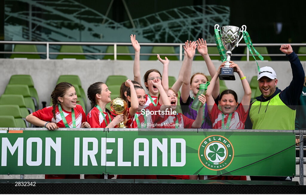 29 May 2024; Gurrane NS, Cork, players celebrate after winning the girls section A cup, for small sized schools, during the FAI Primary 5s Finals day at Aviva Stadium in Dublin. Photo by Stephen McCarthy/Sportsfile