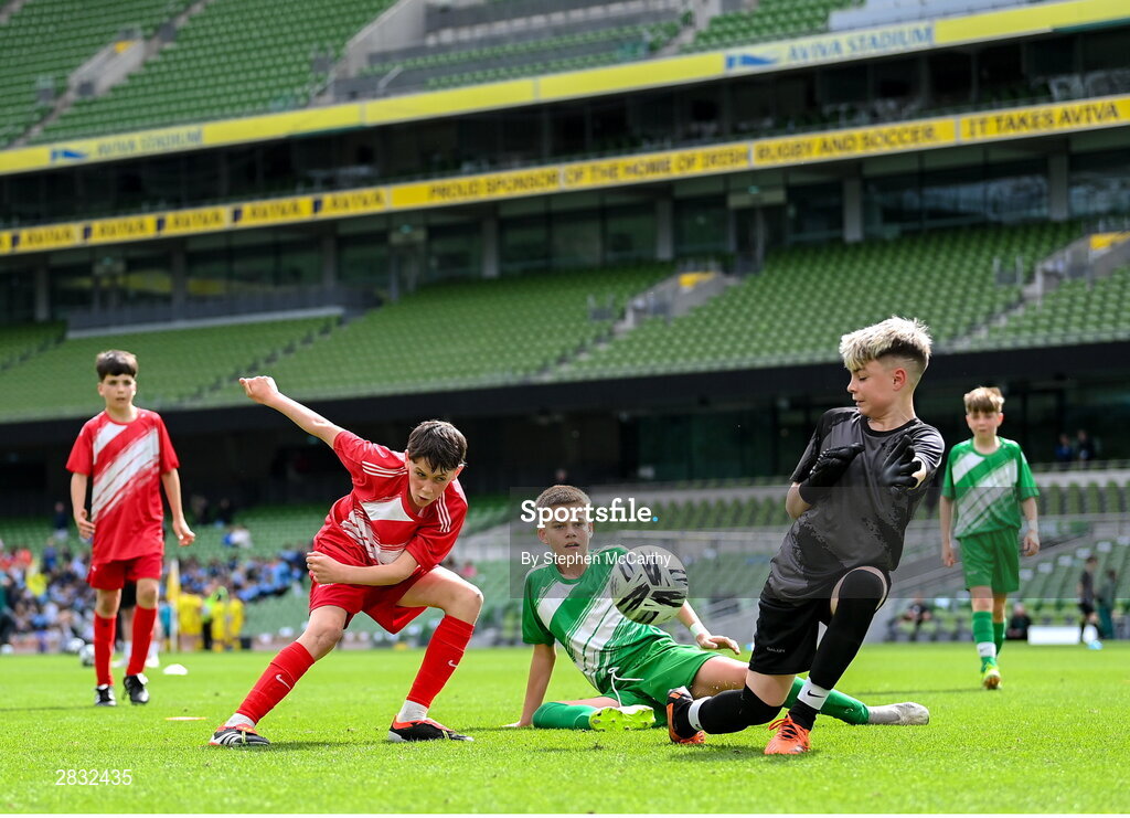29 May 2024; Action from the section B cup, for mixed medium sized schools, match between Gaelscoil Choinn tSáile, Cork, and Scoil Phádraig, Westport, Mayo, during the FAI Primary 5s Finals day at Aviva Stadium in Dublin. Photo by Stephen McCarthy/Sportsfile