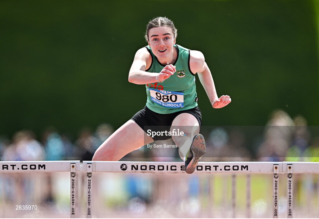 1 June 2024; Veronica O`Neill of Thornhill College Derry, on her way to winning the senior girls 100m hurdles during day two of the 123.ie All-Ireland Schools’ Track and Field Championships at Tullamore Harriers Athletics Club in Offaly. Photo by Sam Barnes/Sportsfile