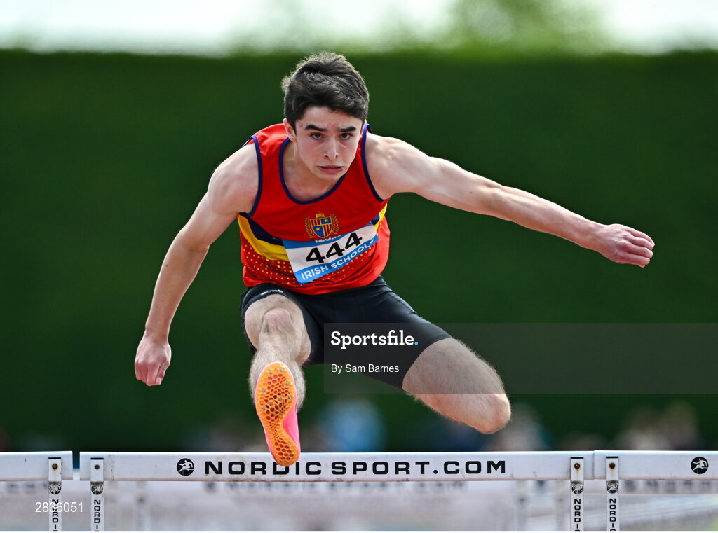 1 June 2024; Des O'Neill of St. Fintans, on his way to winning the inter boys 100m hurdles during day two of the 123.ie All-Ireland Schools’ Track and Field Championships at Tullamore Harriers Athletics Club in Offaly. Photo by Sam Barnes/Sportsfile