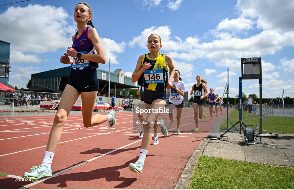 1 June 2024; Blaithin Moran of Our Ladys Bower Athlone, and Holly Renton of Sacred Heart Westport, Mayo, competing in the junior girls 1500m during day two of the 123.ie All-Ireland Schools’ Track and Field Championships at Tullamore Harriers Athletics Club in Offaly. Photo by Sam Barnes/Sportsfile