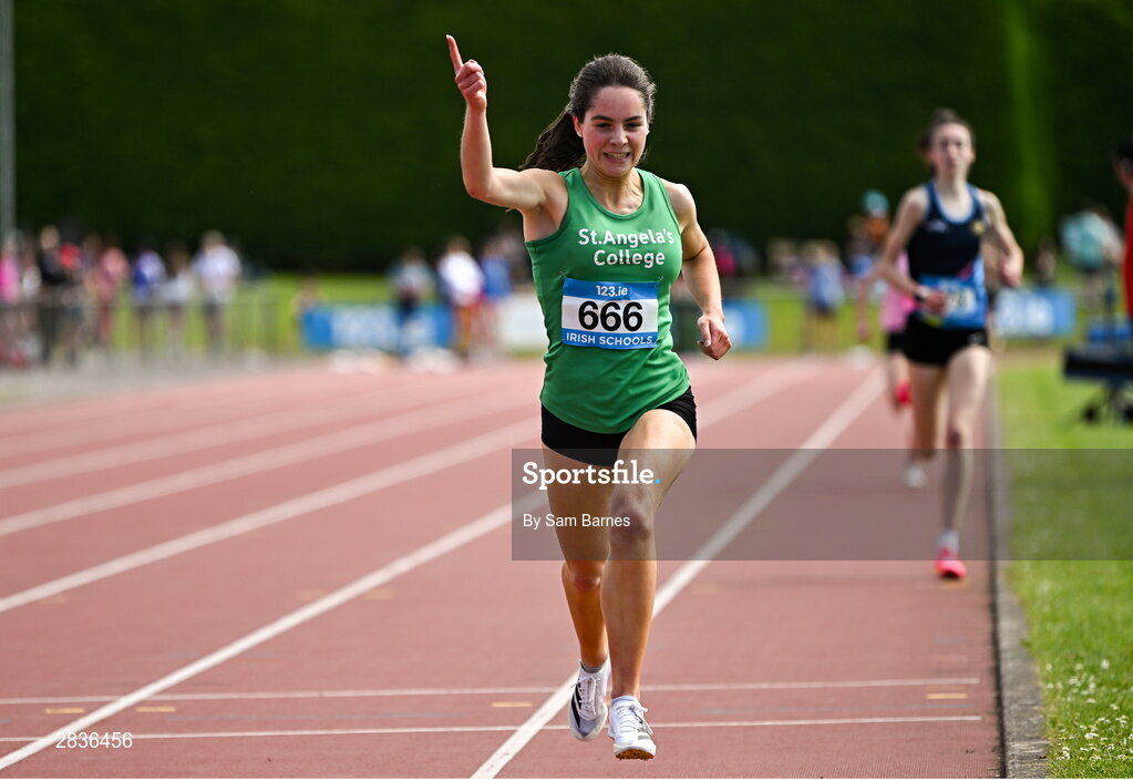 1 June 2024; Nicole Dinan of St. Angelas Cork , celebrates on her way to winning the senior girls 1500m during day two of the 123.ie All-Ireland Schools’ Track and Field Championships at Tullamore Harriers Athletics Club in Offaly. Photo by Sam Barnes/Sportsfile