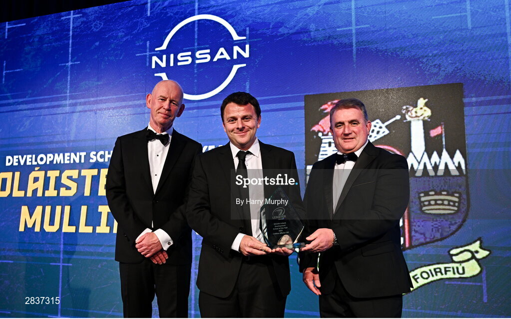 1 June 2024; Robert Blighe of Coláiste Mhuire CBS, Mullingar, is presented with the Nissan Ireland Development School of the Year award by Seamus Morgan of Nissan Ireland at the 2024 Leinster Rugby Awards Ball at The InterContinental Hotel in Dublin. Photo by Harry Murphy/Sportsfile