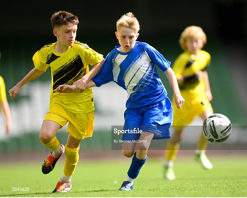 29 May 2024; Eoghan Hosie of Kentstown NS, Meath, and Jayme Lafferty of St Eunan’s NS, Raphoe, Donegal, left, during the FAI Primary 5s Finals day at Aviva Stadium in Dublin. Photo by Stephen McCarthy/Sportsfile