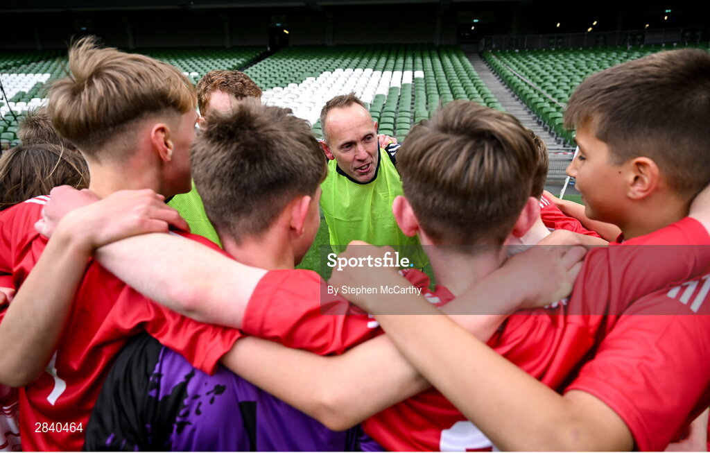 29 May 2024; Beaumont BNS, Blackrock, Cork, players and coaches after winning the section C cup, for mixed large sized schools, during the FAI Primary 5s Finals day at Aviva Stadium in Dublin. Photo by Stephen McCarthy/Sportsfile