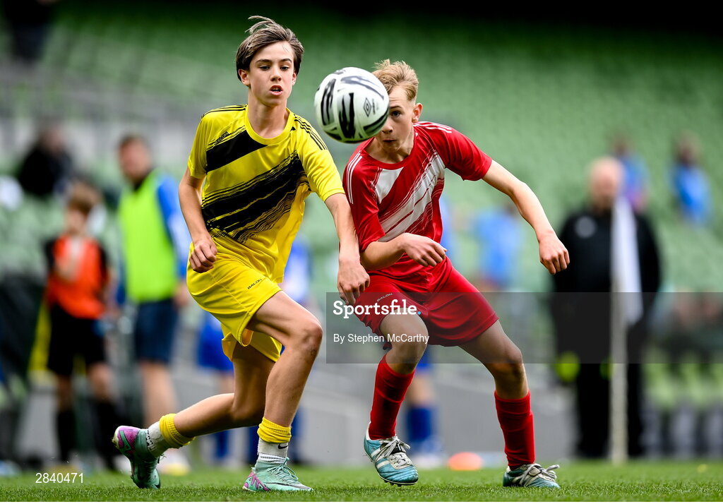 29 May 2024; Sam Bruton of Beaumont BNS, Blackrock, Cork, right, and Ethan Buchanan of Illistrin NS, Donegal, during the FAI Primary 5s Finals day at Aviva Stadium in Dublin. Photo by Stephen McCarthy/Sportsfile