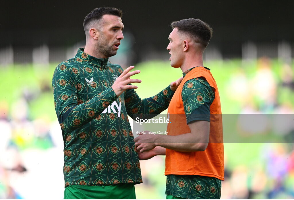 4 June 2024; Shane Duffy of Republic of Ireland speaks to teammate Dara O'Shea before the international friendly match between Republic of Ireland and Hungary at Aviva Stadium in Dublin. Photo by Ramsey Cardy/Sportsfile