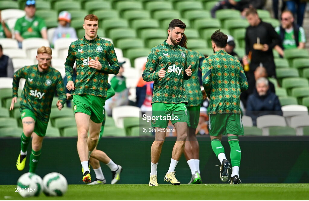 4 June 2024; Finn Azaz of Republic of Ireland, second right, warms up before the international friendly match between Republic of Ireland and Hungary at Aviva Stadium in Dublin. Photo by Ben McShane/Sportsfile