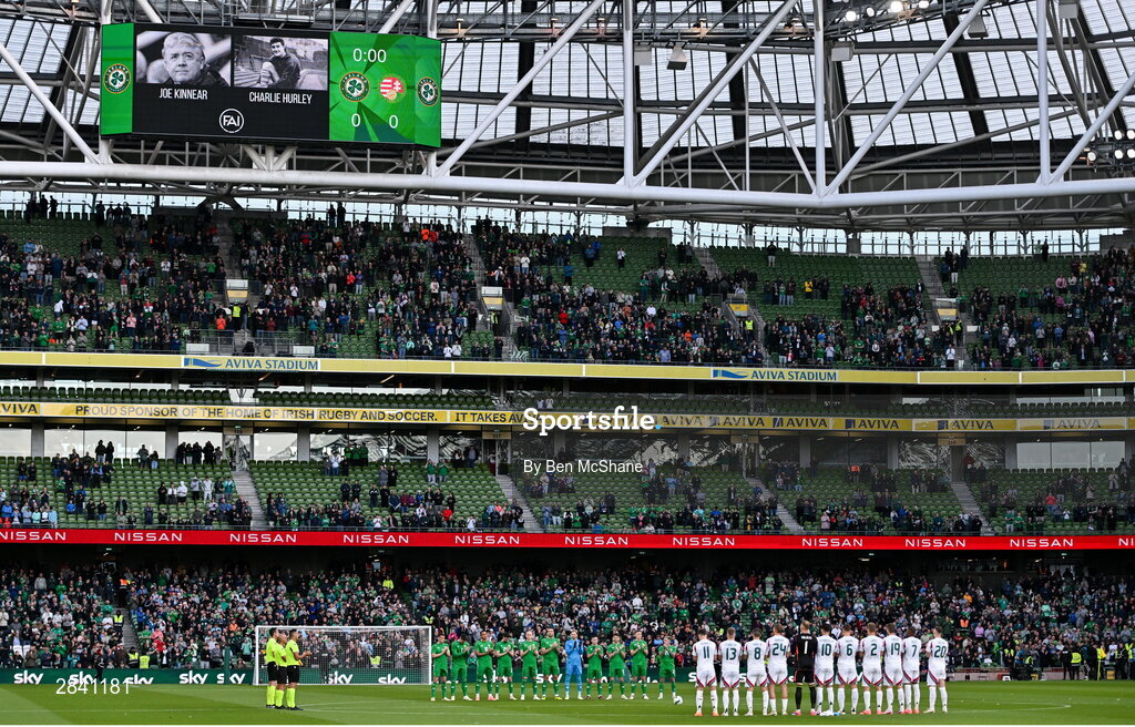 4 June 2024; Republic of Ireland and Hungary players observe a moments applause for the late former Republic of Ireland internationals Joe Kinnear and Charlie Hurley before the international friendly match between Republic of Ireland and Hungary at Aviva Stadium in Dublin. Photo by Ben McShane/Sportsfile
