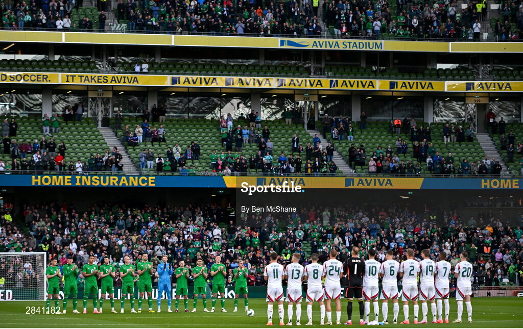 4 June 2024; Republic of Ireland and Hungary players observe a moments applause for the late former Republic of Ireland internationals Joe Kinnear and Charlie Hurley before the international friendly match between Republic of Ireland and Hungary at Aviva Stadium in Dublin. Photo by Ben McShane/Sportsfile